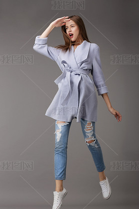 Emotional Young Woman in Outer Garments