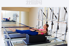 Pilates reformer woman back stroke exercise