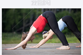 Yoga class: Downward facing dog pose