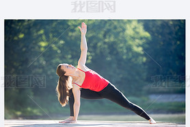 Teenage girl in Extended Side Angle Pose