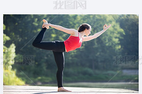 Teenage girl in Natarajasana pose