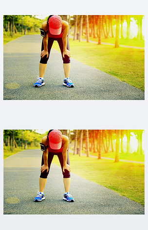 累了的女跑步运动员休息