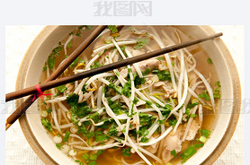 Vietnamese pho soup, an ethnic meal of chicken soup