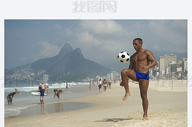 Young Brazilian Man Playing Altinho Beach Football