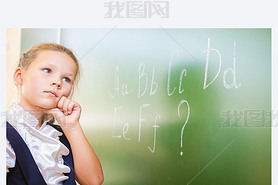 Schoolgirl wrote in chalk on blackboard and teach English language