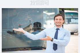 Cheerful young man is advertising a public transport