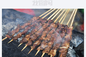 Delicious street food of Barbecued Lamb shish kebabs on the streets of Guilin, Guangxi Autonomous Re