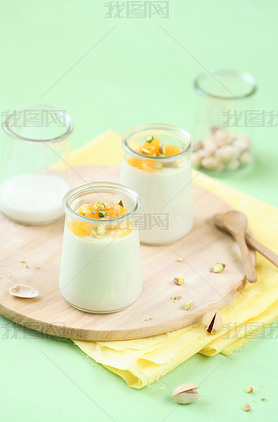 Pistachio Panna Cotta with Honey Orange Sauce