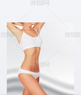 Slim woman against abstract background