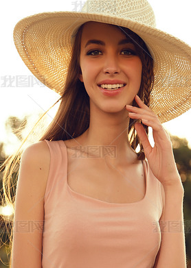 beautiful woman in elegant dress and hat