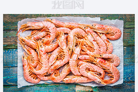 fresh raw prawns on paper 