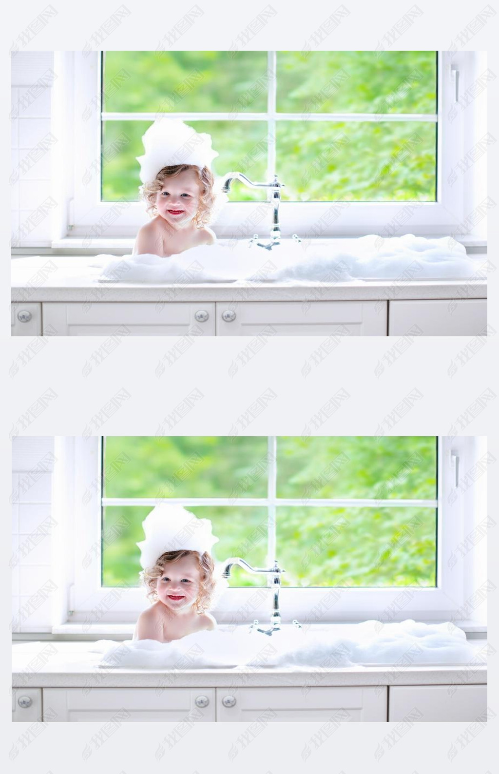 Baby girl taking bath with foam