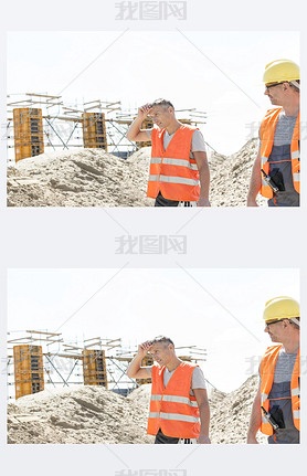 worker looking at tired colleague