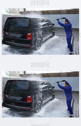 Worker cleaning automobile with high pressure water jet at car w