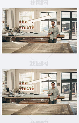 designer standing in workshop with cup of coffee
