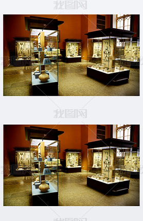 博物馆陈列在玻璃柜中的古代文物的