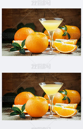 Yellow cocktail with orange juice in a martini glass