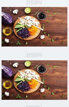 The concept of dietetic vegetarian food. Bright juicy shredded vegetables, such as carrots, purple c