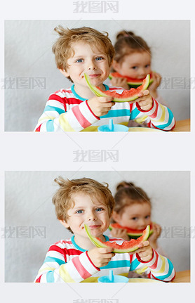 Little kid boy and girl eating healthy food watermelon