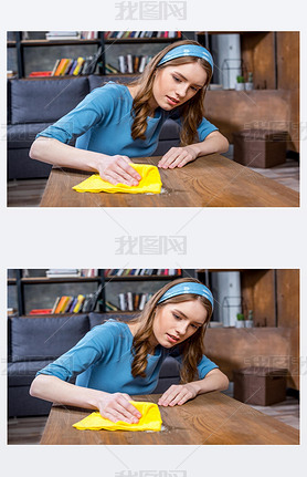 Woman cleaning table