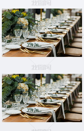 Decorated plate with fork and spoon. Table set up in boho style with pampas grass and greenery