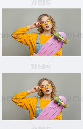 Pretty young woman with pink skateboard and sunglasses
