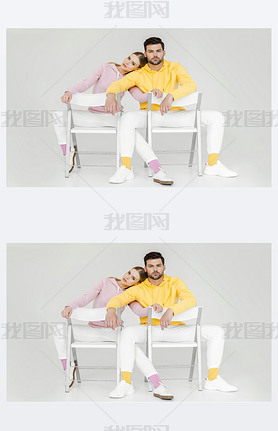 couple of models sitting on chairs and looking at camera on white
