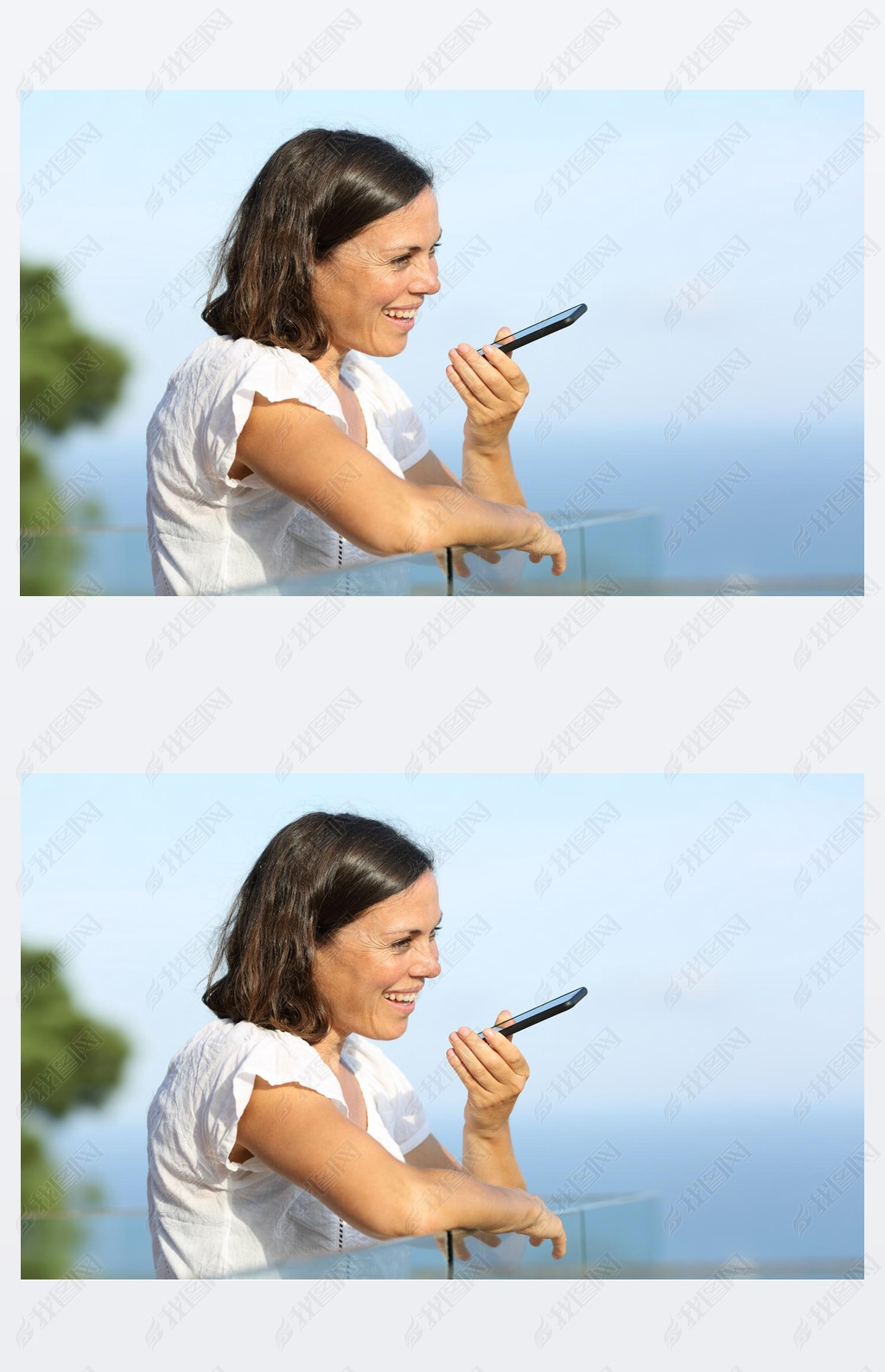 Happy adult woman using voice recognition on art phone standing in a balcony on the beach