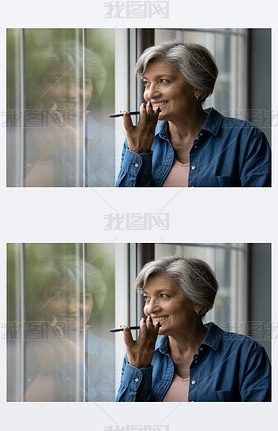 Happy middle aged elderly woman recording audio message.