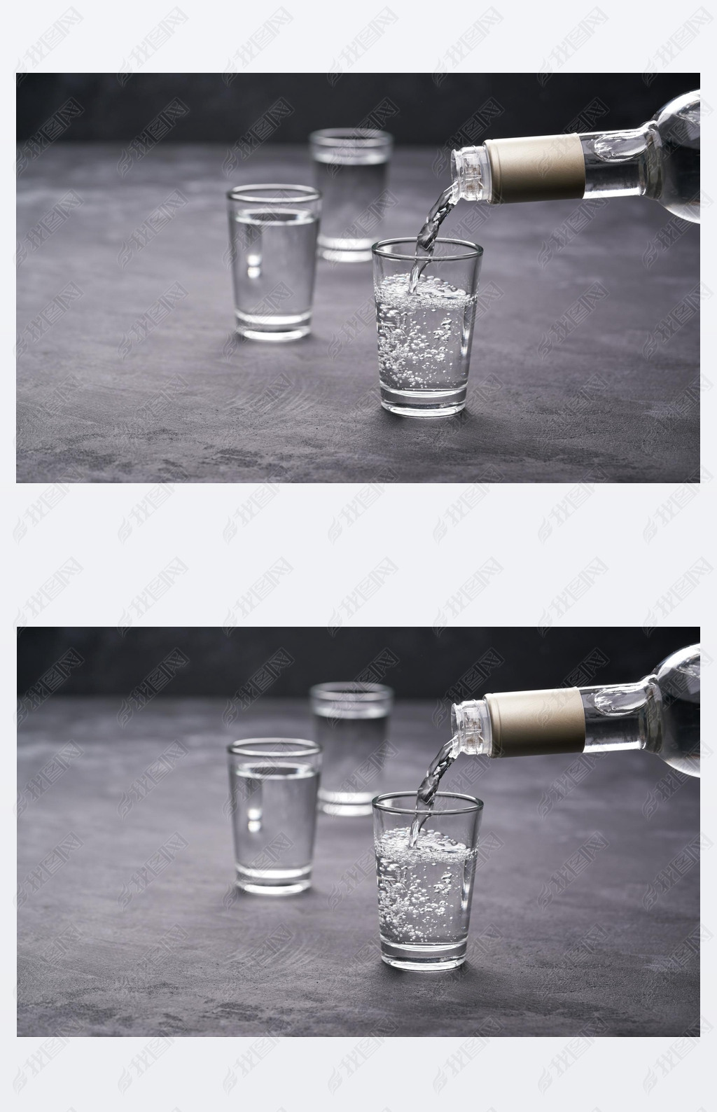 Pouring vodka into the glass on a black background, selective focus