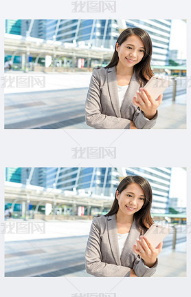 Businesswoman using mobile phone