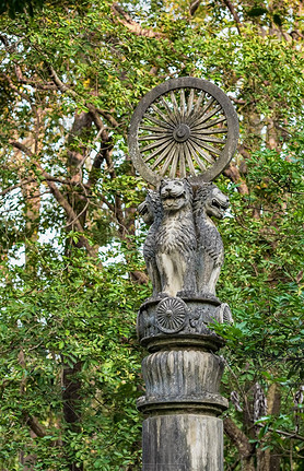 Ashoka wheel of Dharma over four lion heads in Thailand