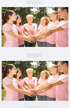 Female Volunteers Supporting Breast Cancer Patients Holding Hands In Park