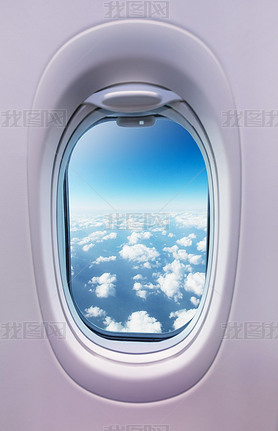 Airplane interior with window view of clouds. Concept of trel and air transportation