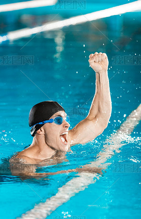 winning muscular swimmer