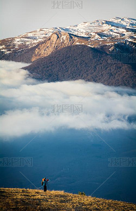 The photographer shoots the sunrise. Demerdzhi, Crimea