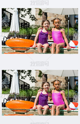 girls in swimsuits hugging while sitting at poolside near inflatable ball and ring