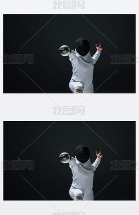 Fencer in fencing mask exercising with rapier isolated on black 