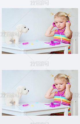 Little girl playing doctor with toy puppy