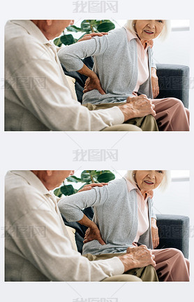 cropped view of husband looking at wife with back pain in apartment 