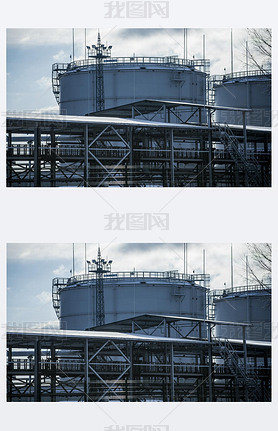 A view of the fuel tanks in the port on a cloudy winter day