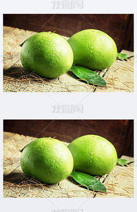 Pomelo fruit on the old wooden table