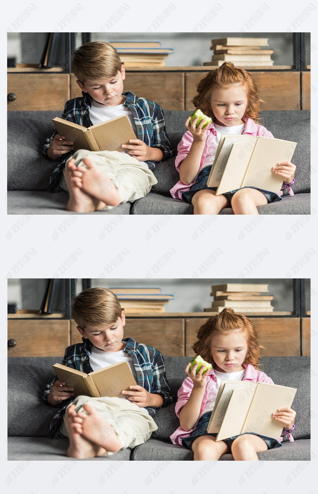 concentrated little brother and sister reading books on couch at home