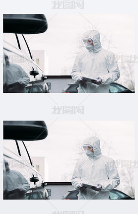 selective focus of asian epidemiologist in hazmat suit and respirator mask holding digital tablet wh