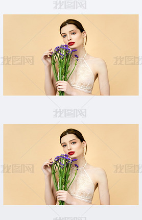 young beautiful woman holding purple limonium flowers isolated on beige 