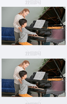 Private music teacher giving piano lessons to little boy