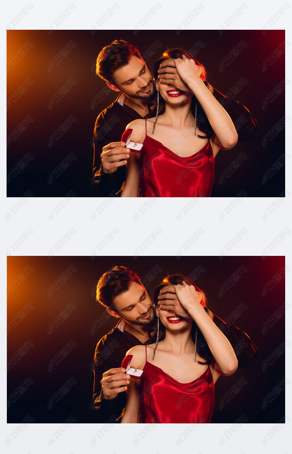 英俊的男人蒙住女友的眼睛拿着装有珠宝戒指的礼品盒背景是黑色的点着