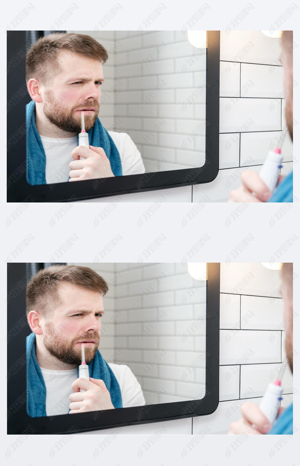 Serious man brushing his teeth with an electric oral irrigator with a jet of water, looking in the m