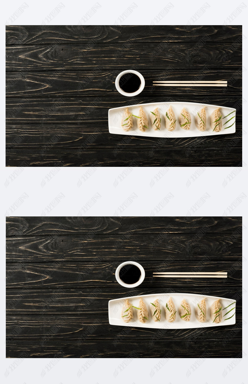 top view of delicious Chinese boiled dumplings on plate near chopsticks and soy sauce on black woode