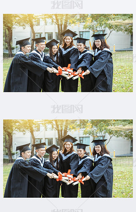 happy  students in graduation gowns holding diplomas on university campus